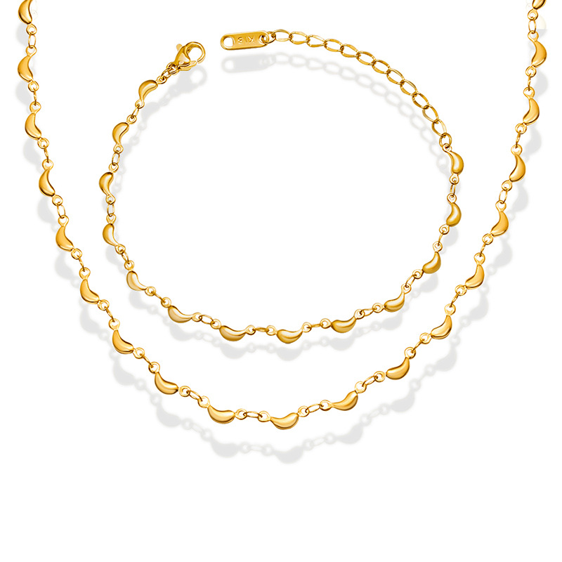 Conjunto de joyería transfronteriza chapada en oro, pequeño animal fresco y dulce europeo y americano, colgante de delfín, collar, material de acero de titanio