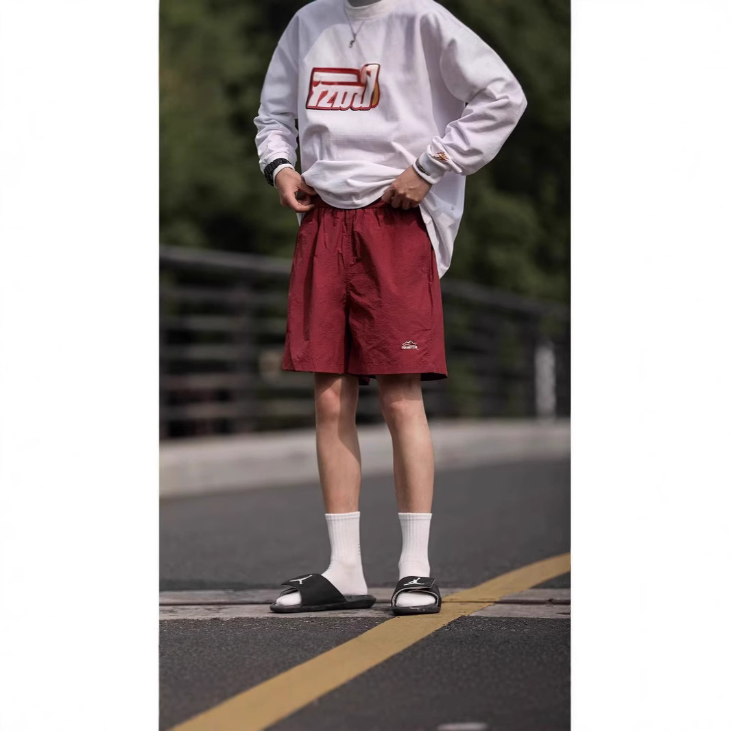 Summer Japanese travel solid color quick dry sports shorts for men…