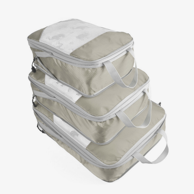 메쉬가 포함된 베이지색 여행용 압축 3종 세트