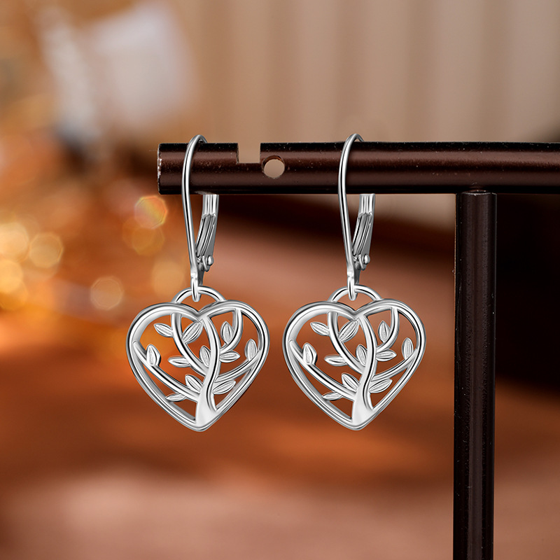 Pendientes de árbol de la vida de plata de ley 925 nuevos transfronterizos Pendientes de corazón hueco simple de moda de Amazon europeo y americano Pendientes