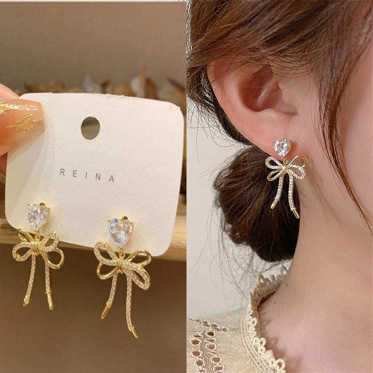 Fresh cute earrings with zircon with bow