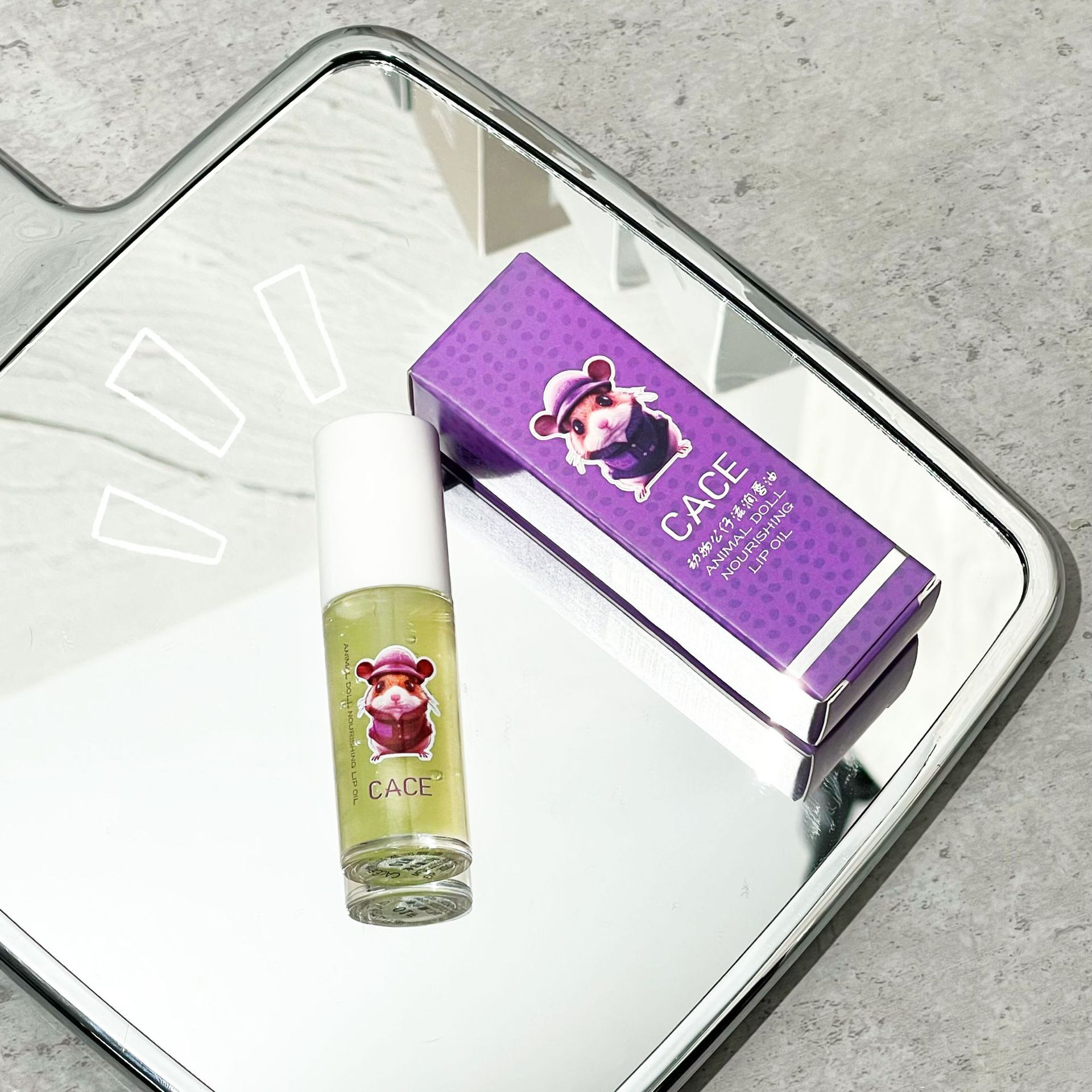 CACE Animal Doll Lip Oil Moisturizes and hydrates, nourishing lip lotion protects lips, reduces lip lines, and makes lips plump. Cross-border wholesale undefined