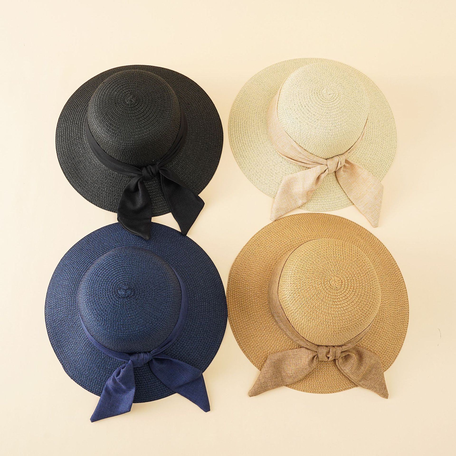Sombrero de estilo coreano de las mujeres del verano arco sombrero para el sol sombrero de paja de playa al aire libre sombrero de sol de ala ancha