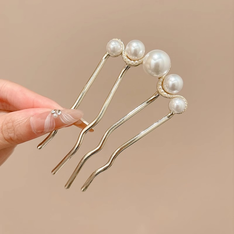 Perla en forma de U cuatro dientes peinado temperamento femenino bandeja de cabello detrás de la cabeza bola clip de cabello de alta sensación retró joyería para el cabello