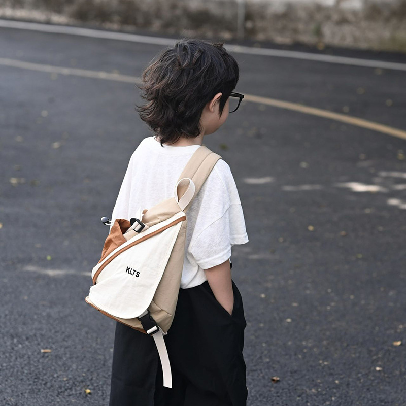 Coreano Chao Cool bolso de pecho para niños y niñas, moda de color contrastante, mochila de bebé de gran capacidad, mochila de hombro para niños casuales al aire libre