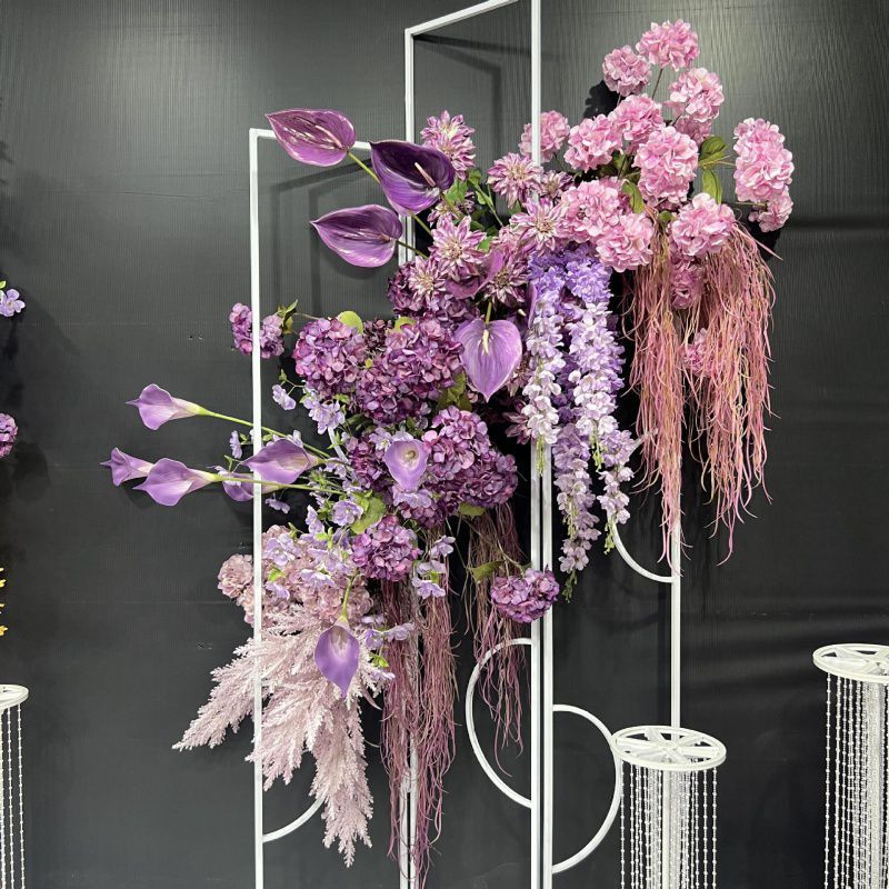 中国式の結婚祝いの道はボタンの花を引いて背景を掛けて花のアーチの花の芸を掛けて結婚式の装飾の花の柱の婚約の専門商品を配置します。|undefined