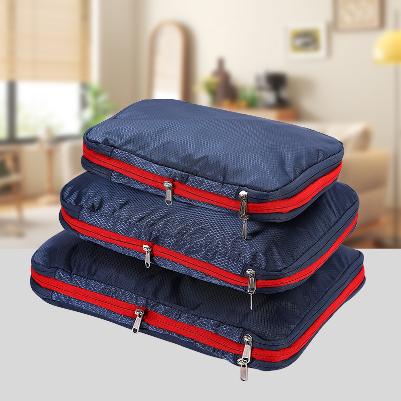 Bolsa de almacenamiento de compresión de viaje explosiva de Amazon Bolsa de almacenamiento de tres piezas de gran capacidad Juego completo de bolsa de almacenamiento de ropa impermeable