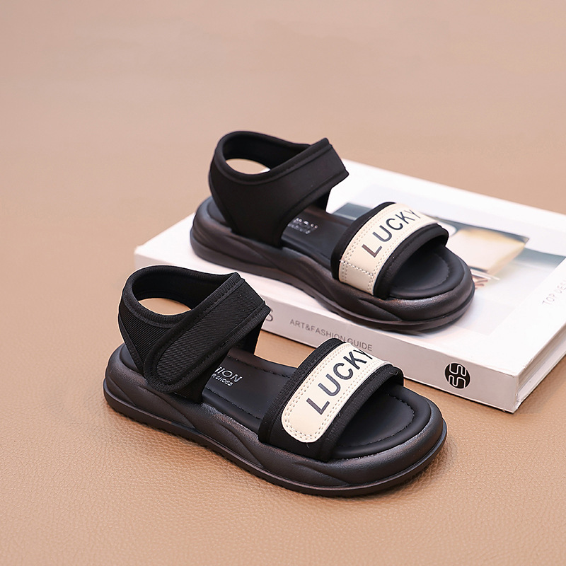 Sandalias para niñas 2025 verano nuevo estilo zapatos de playa con punta abierta y suela blanda para niños grandes sandalias para niñas zapatos de princesa marea image 3