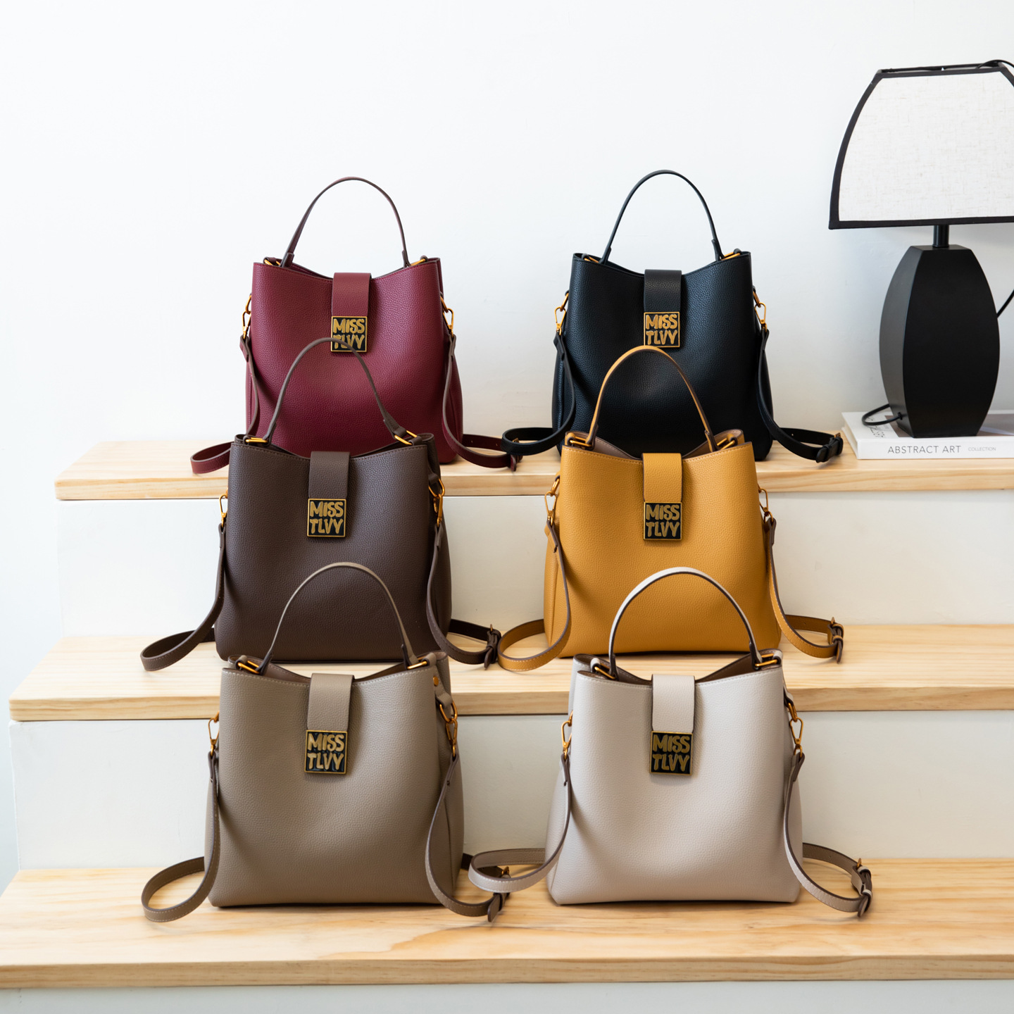 Lichi estampado bolso de cubo de moda lujoso ligero nicho de moda mochila de hombro de viaje diario bolso de mano ocio