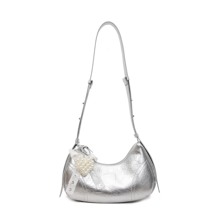 Bolso de axila de textura de alta calidad 2025 verano nuevo bolso femenino moda patrón de agarre de mano bolso bandolera con letras extranjeras