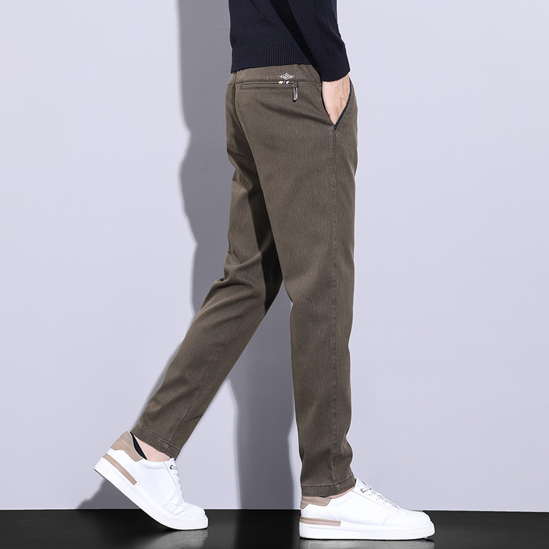 Pantalones juveniles populares para hombres casuales Otoño e Invierno nuevos pantalones antiarrugas resistentes al desgaste pantalones de todos los partidos juveniles elásticos pantalones casuales cómodos