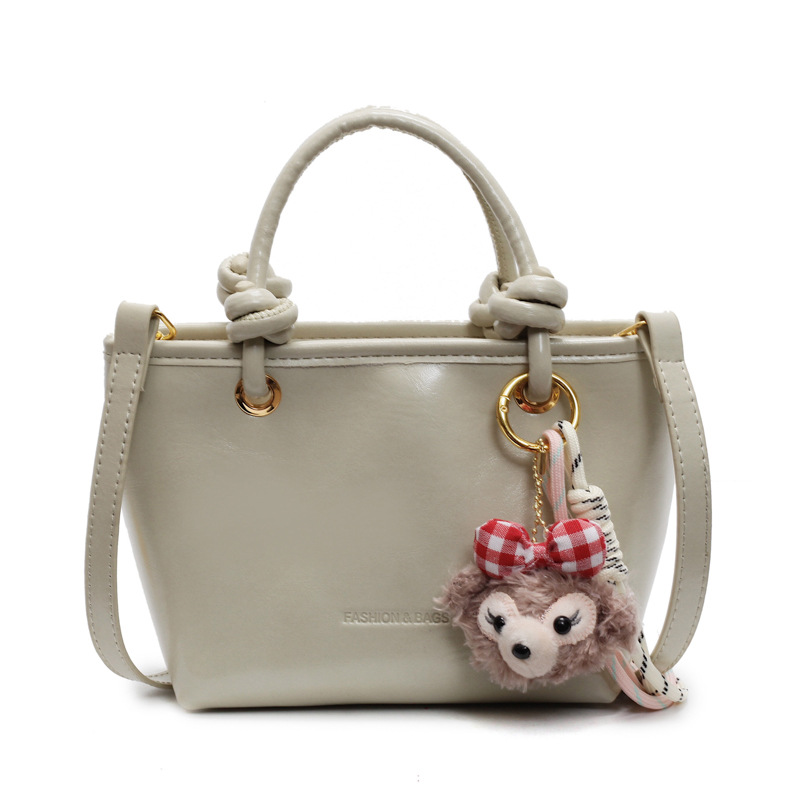 Este año popular bolso de cubo de mano caliente 2025 nuevo bolso de mujer bolso de hombro casual versátil bolso de alta calidad