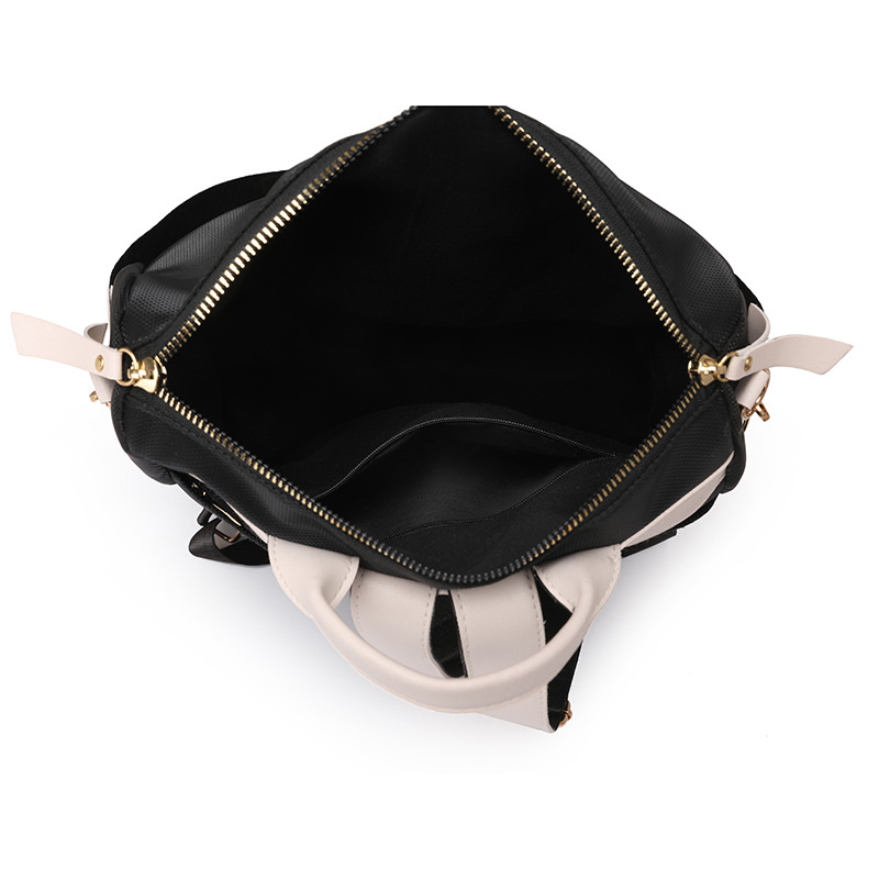 Comercio exterior al por mayor 2023 nuevo estilo casual señoras PU mochila moda contraste color gran capacidad mochila de viaje de doble uso marea