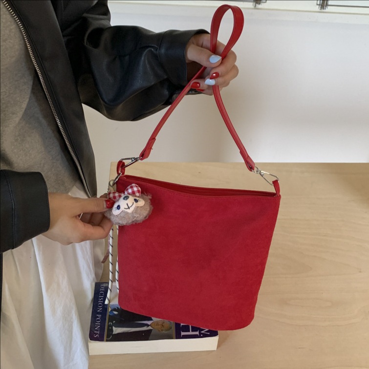 Transfronterizos bolsas de brazo simples para mujeres otoño y invierno 2025 nuevo bolso de cubo de seda multicolor bolso de hombro de viaje mochila