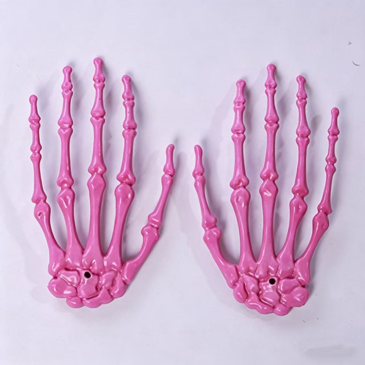 Accesorios de Halloween esqueleto transfronterizo hueso de mano de plástico colorido hueso de mano fantasma accesorios de decoración fuente directa