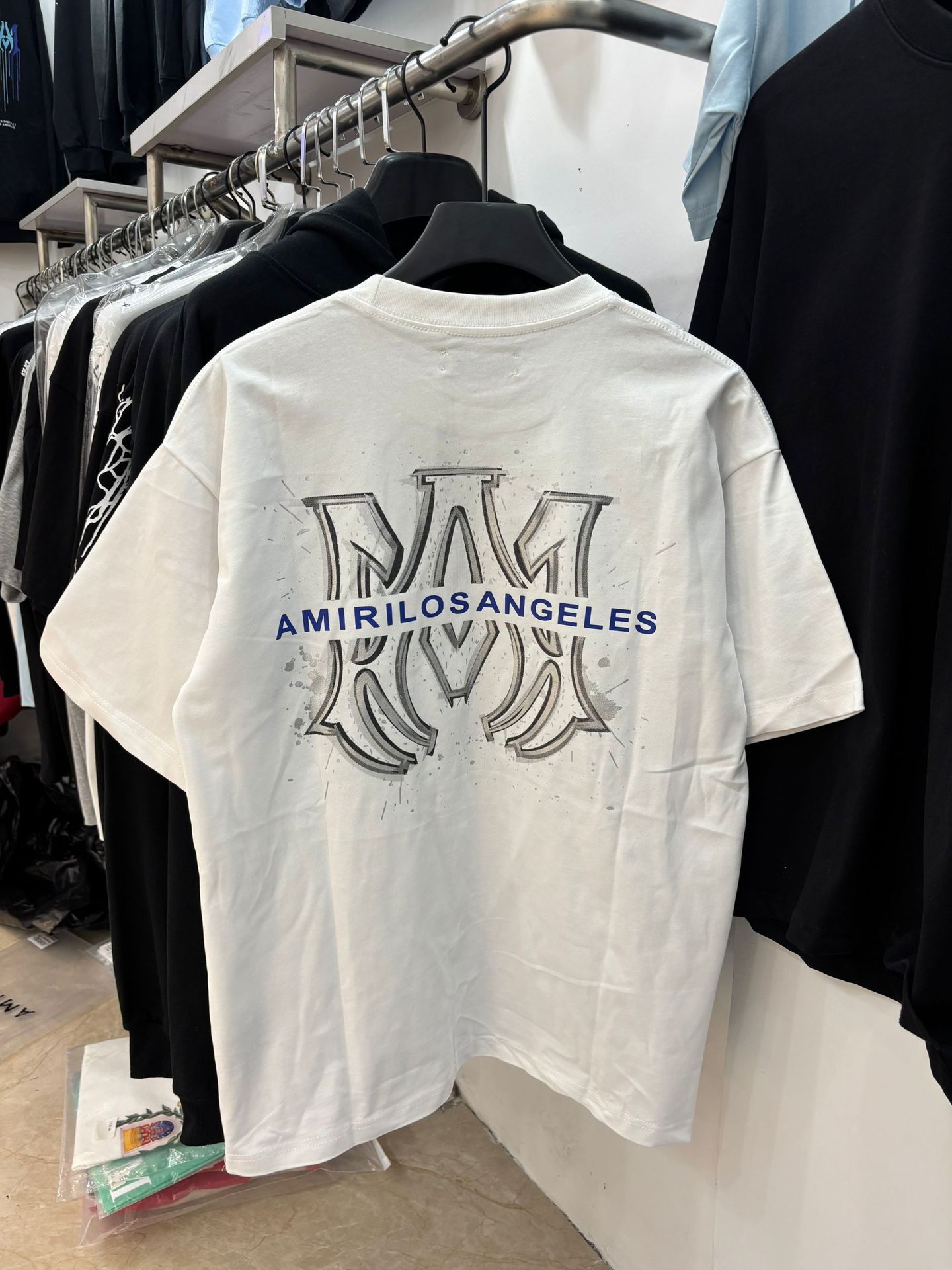 Verano nueva camiseta de manga corta impresa de letras suelta marca de moda hombre camiseta casual de media manga mujer