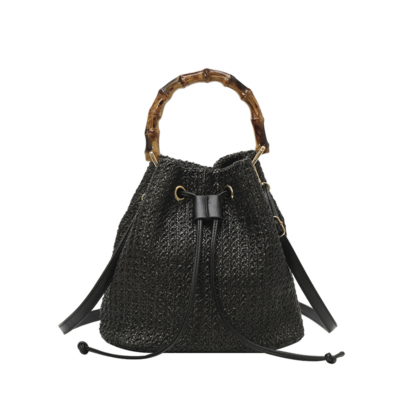 Bolso de cubo de vacaciones junto al mar 2025 nuevo bolso de bambú bolso de hombro de color de contraste tejido de paja bolso de mensajero para mujer de playa