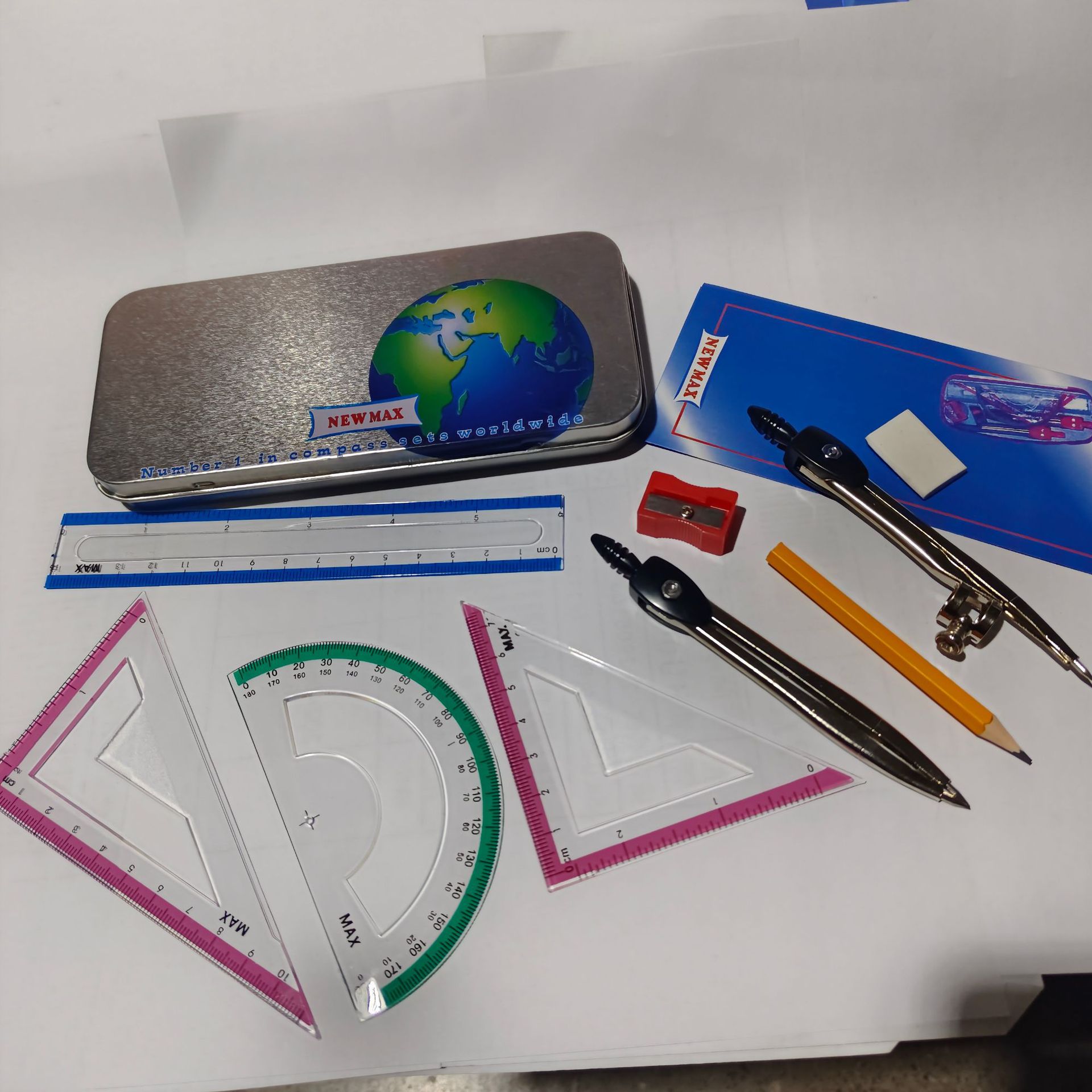 caja de lata transfronteriza 9 piezas de herramientas de dibujo de la brújula metálica regla de regla de regla de triángulo regla recta al por mayor image 5