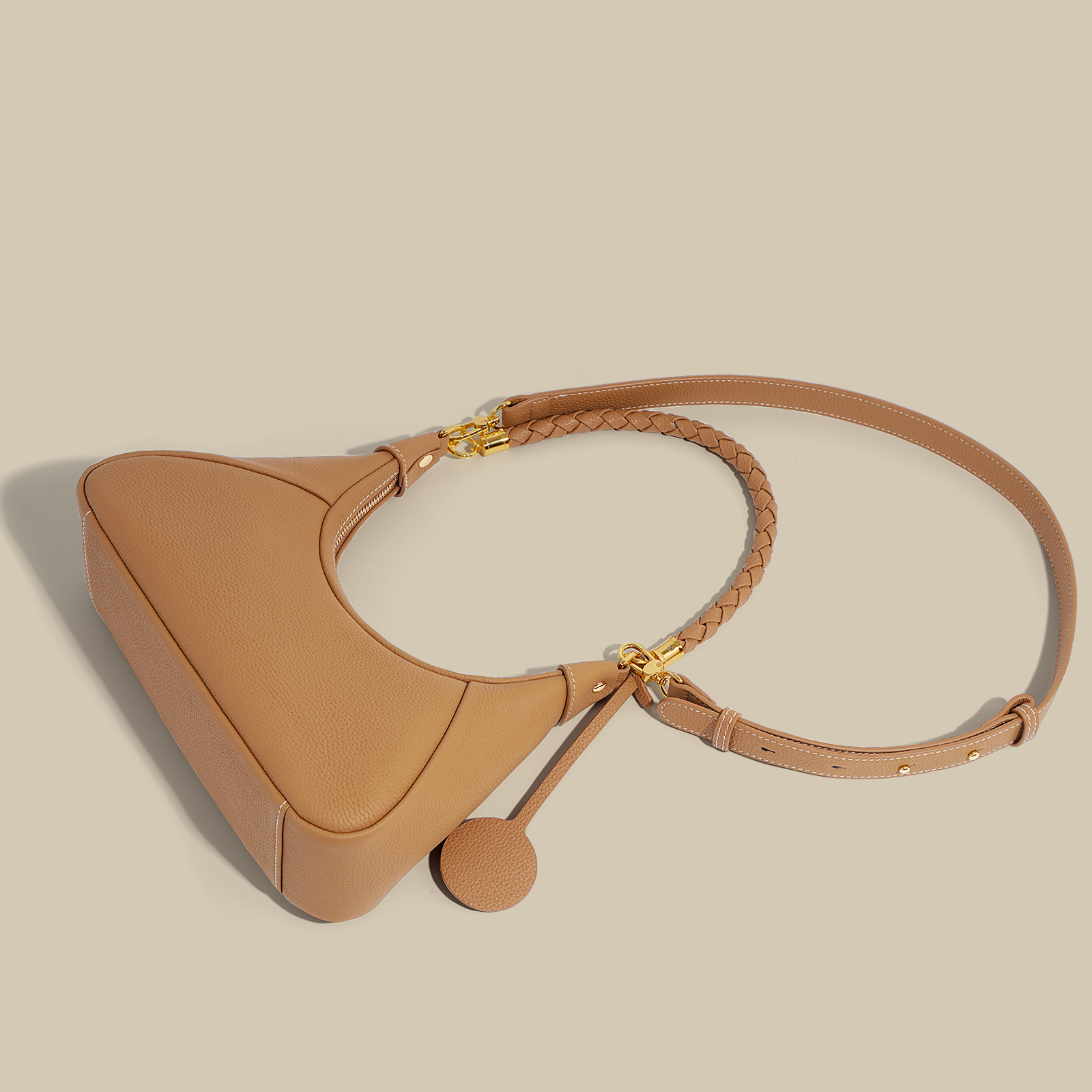 Bolso bandolera tipo media luna para mujer 2025, nuevo bolso de cuero vacuno con textura de alta gama, bolso baguette de hombro cruzado para viajeras.