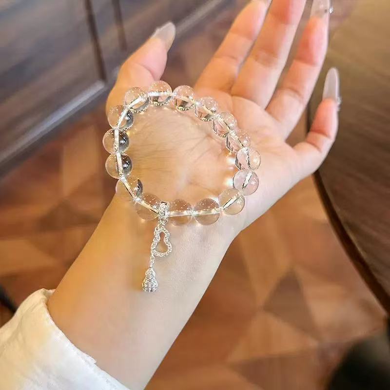 The same style of pink crystal bracelet on Xiaohongshu for women, with a unique and high-end feel. The white crystal bracelet is elegant and stylish. It's a pink crystal bracelet for women, 376 undefined