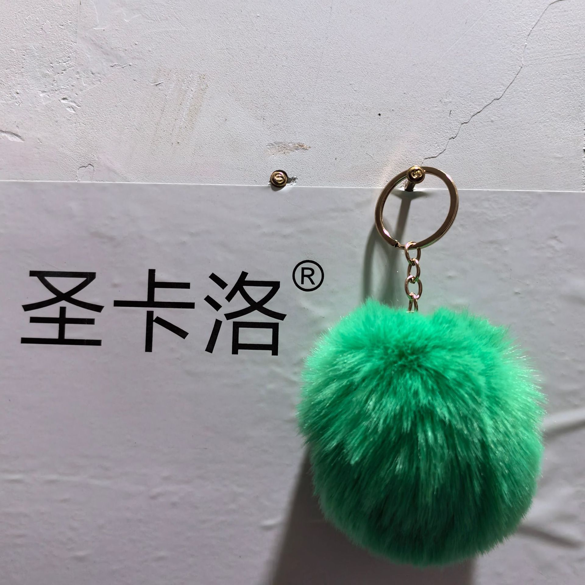 Elemento verde colgante cuerda llavero de peluche de piel artificial bolsa de lana corta colgante damas colgando bolsa accesorios al por mayor