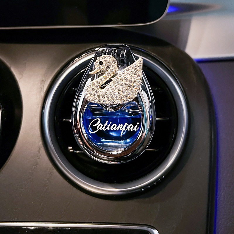 Perfumes de automóviles, salidas de aire, adornos de automóviles