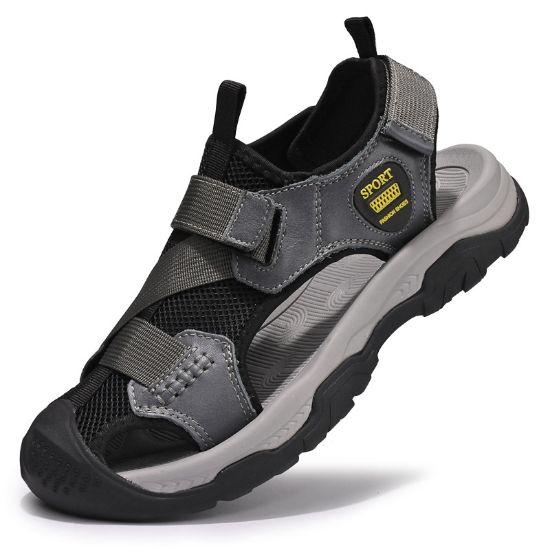 Sandalias ropa exterior de los hombres verano nuevos zapatos de playa de malla transpirable hueca suela suave Baotou zapatos casuales al aire libre antideslizantes