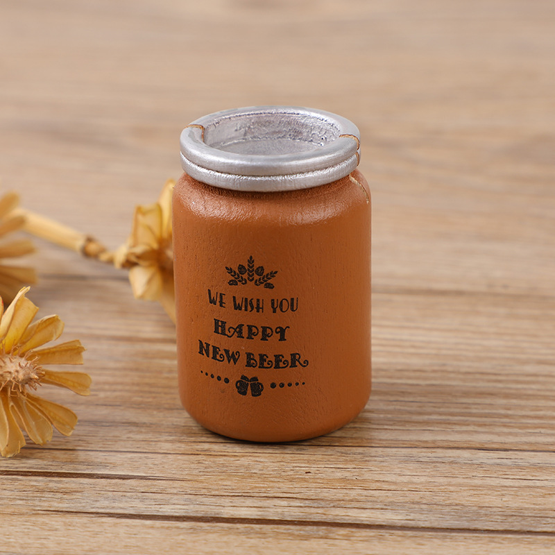 Gran lata de cerveza/100 en una caja