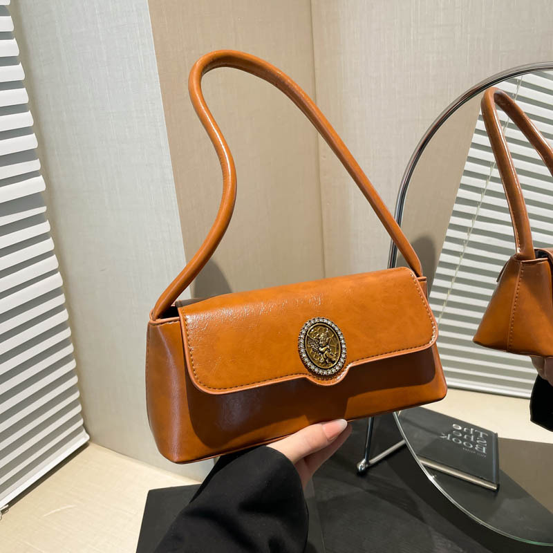 Este año, bolsas de brazo de moda populares 2025, bolsas de hombro de mujer retro de gran capacidad, bolsas de tendencia de estilo extranjero, bolsas pequeñas