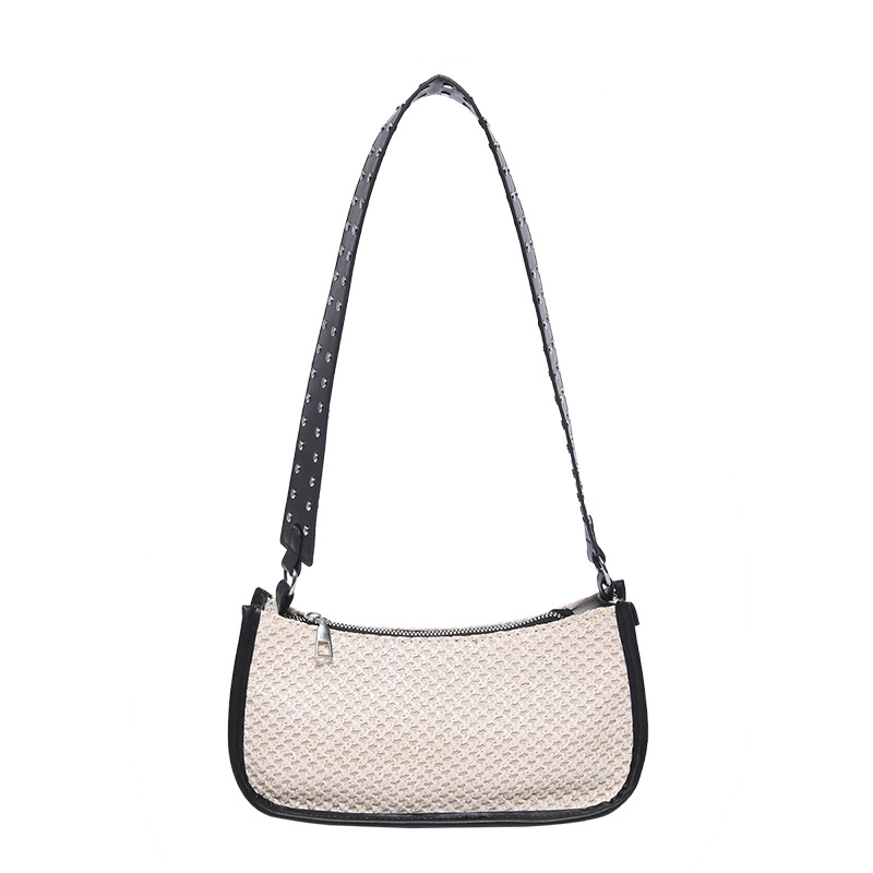 Bolsa trenzada debajo de la axila damas 2024 nuevo estilo ligero de lujo nicho de alta sensación de verano de vacaciones en la playa pastoral bolsa de paja