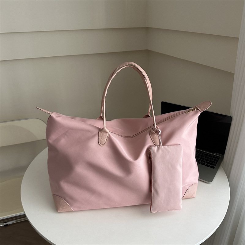 Bolsa de viaje para mujeres 2024 nueva sensación de alto nivel bolsas de bolsas de viajes portátiles bolsas de bolsas de moda de hombro de gran capacidad para mamá
