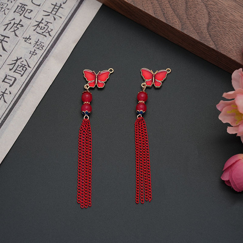 Retro earrings with bow with tassels
