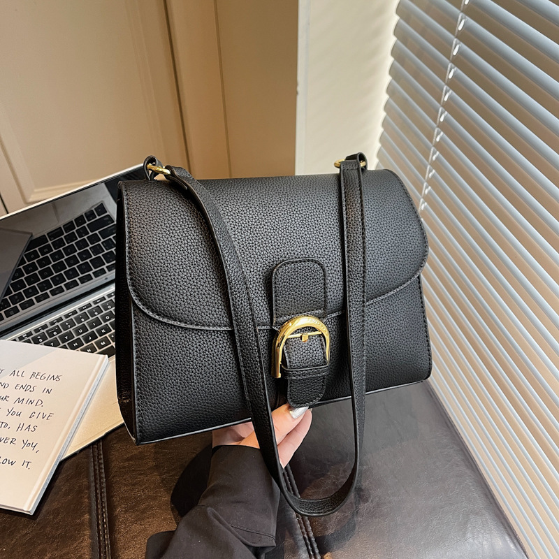 Retro nicho de diseño bolso pequeño para mujeres 2026 nuevo mochila de textura de moda simple mochila de viaje diario