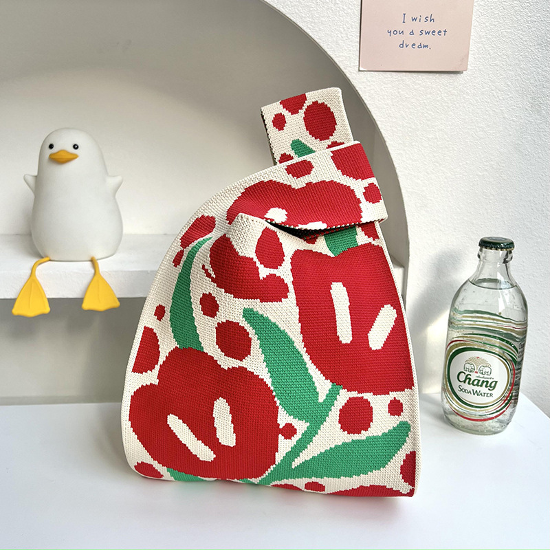 Bolso de punto de flores versión coreana del bolso de hombro de diseño de nicho de moda ins