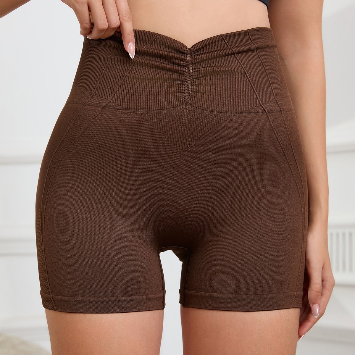 2025 nuevo estilo cintura alta cadera delantero V pantalones cortos de yoga mujeres pantalones cortos ajustados de nailon entrenamiento deportes correr pantalones de fitness