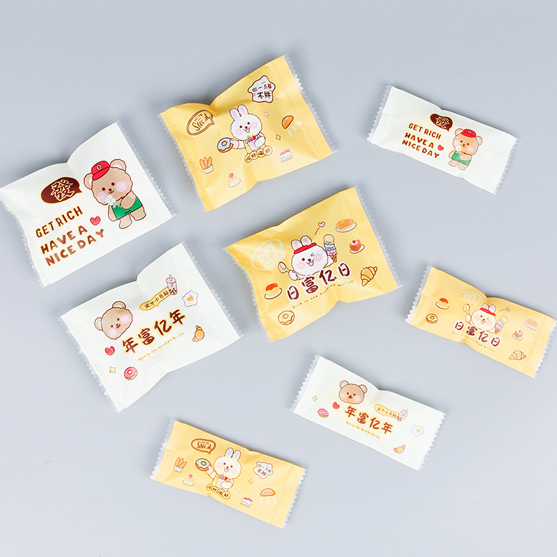 新款四合一卡通小熊雪花酥包装袋可爱文字曲奇饼干机封糖果袋零食