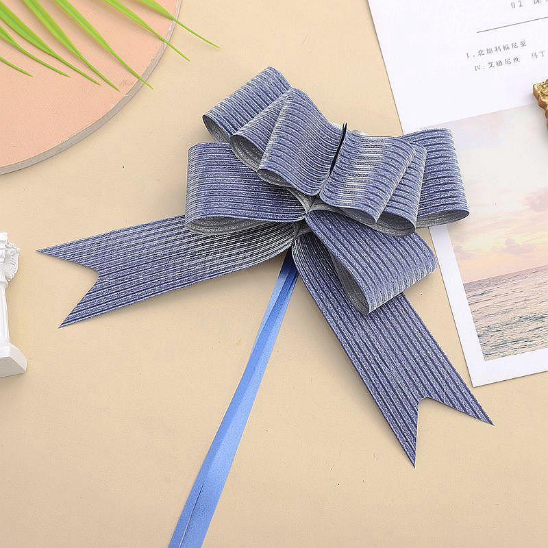 Comercio exterior transfronterizo 50 arco de impresión brillo flor tirada a mano regalo de Navidad embalaje de flores flash diamante tire flor cinta