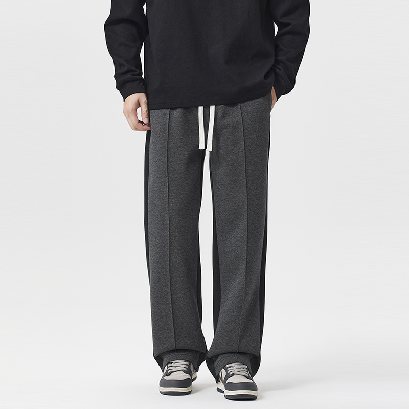 Nuevos pantalones pesados de estilo masculino estilo de moda casual diseño de pantalones de dos colores sueltos pantalones deportivos rectos versátiles