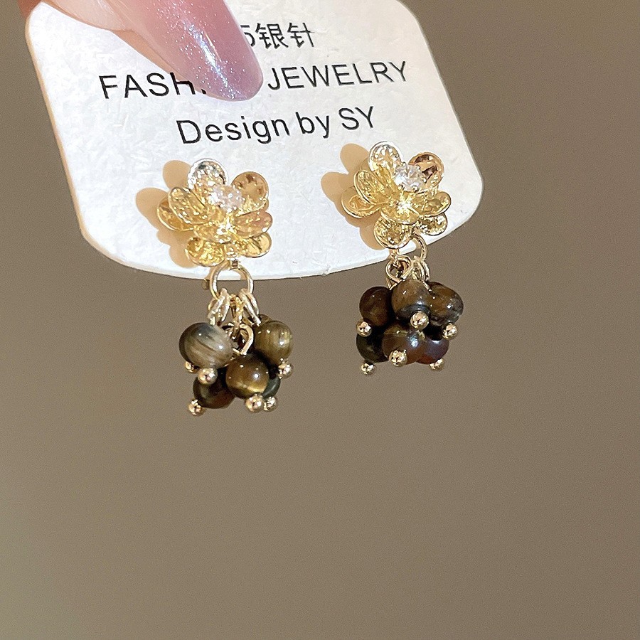 Pendientes de ojo de tigre artificial de color café Maillard con aguja de plata Pendientes simples y de moda de todo fósforo Pendientes ligeros de lujo de alta gama
