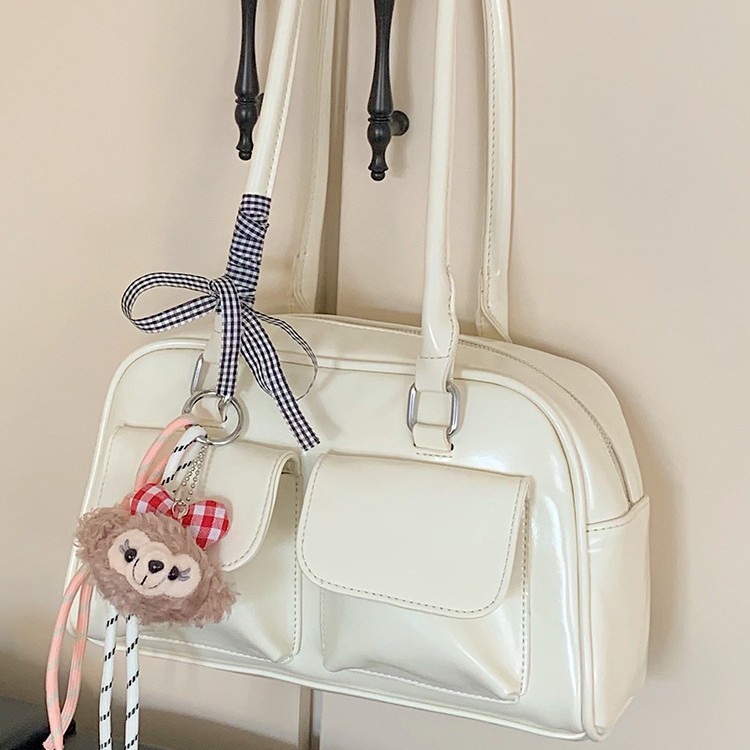 La moda coreana de nicho de estilo extranjero bolsas de palos debajo de las axilas para mujeres 2026 primavera nueva bolsa diaria de Boston bolsas de bolos