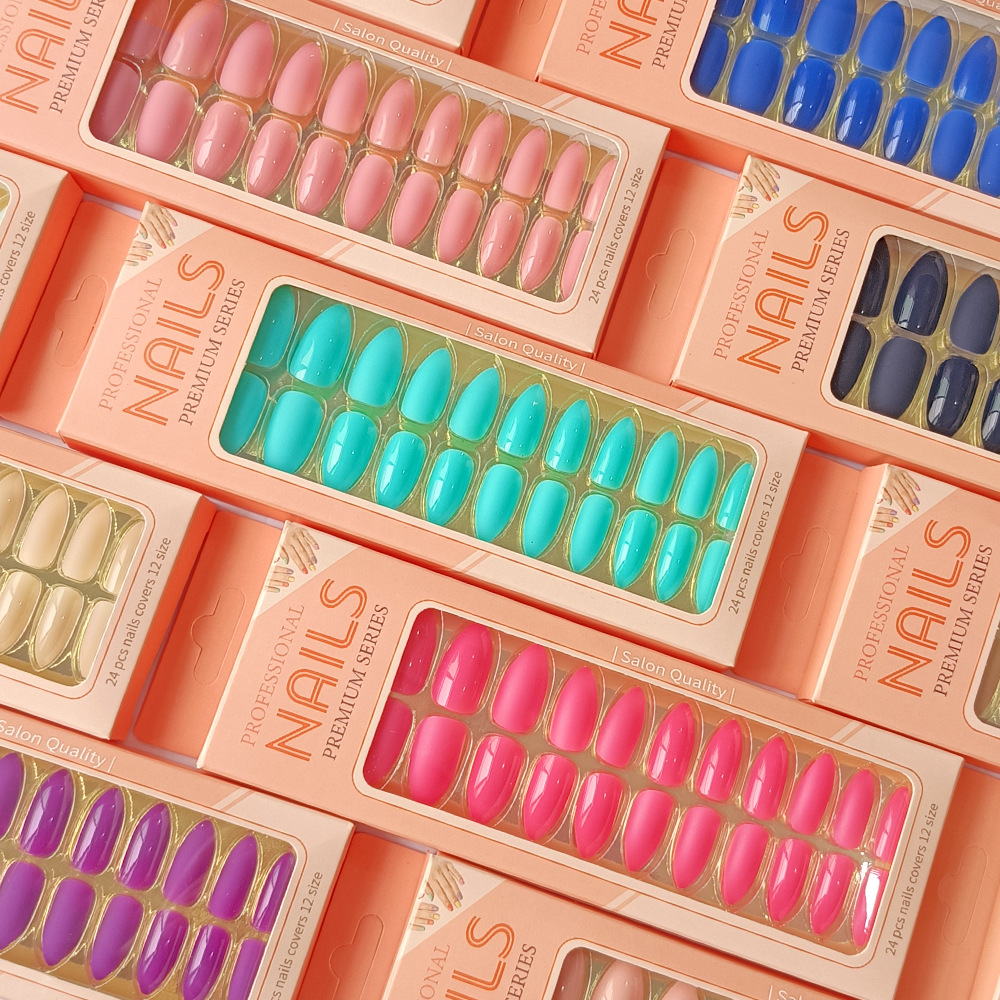 Uñas postizas removibles de color sólido brillante, 24 piezas, puntas de uñas largas en forma de almendra en una caja de papel, uñas de longitud media para decoración de uñas.