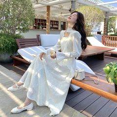 肌理感提花白色收腰连衣裙女春秋2025新款感绝美度假风仙女裙