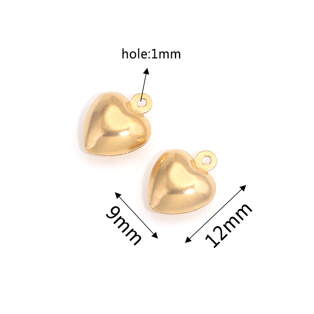 Acero inoxidable hueco melocotón corazón amor corazón colgante pulsera collar DIY pequeño colgante DIY accesorios de la joyería al por mayor