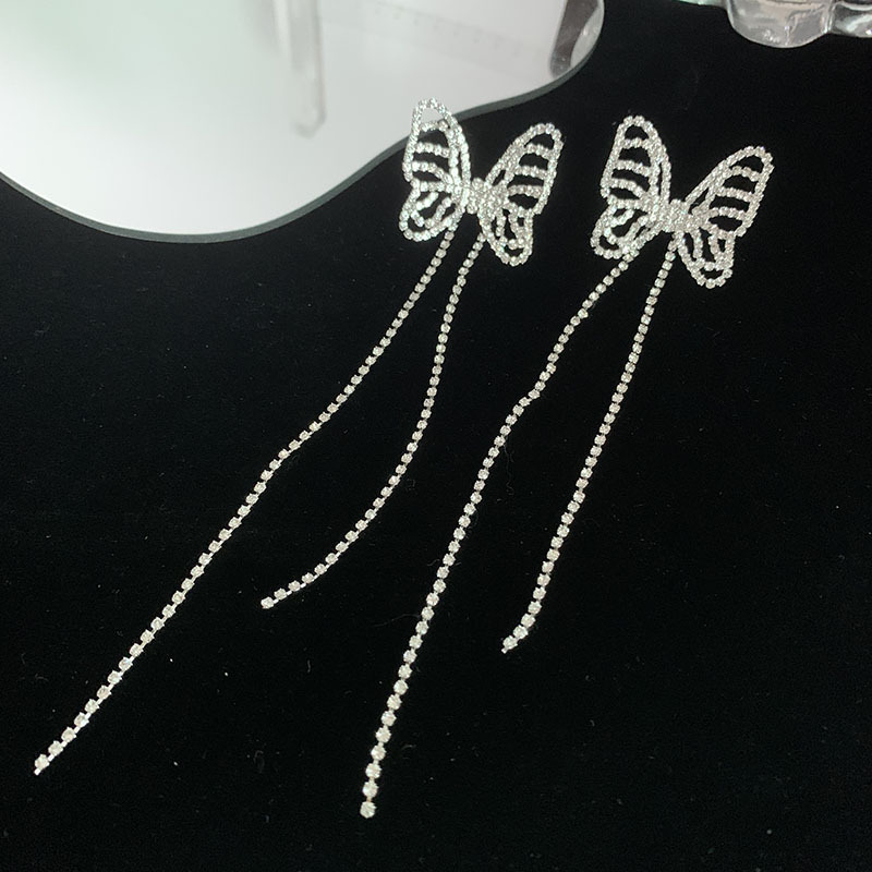 Nihaojewelry Fashion Hollow Butterfly Long Tassel Copper Earrings Wholesale Jewelry display picture 1