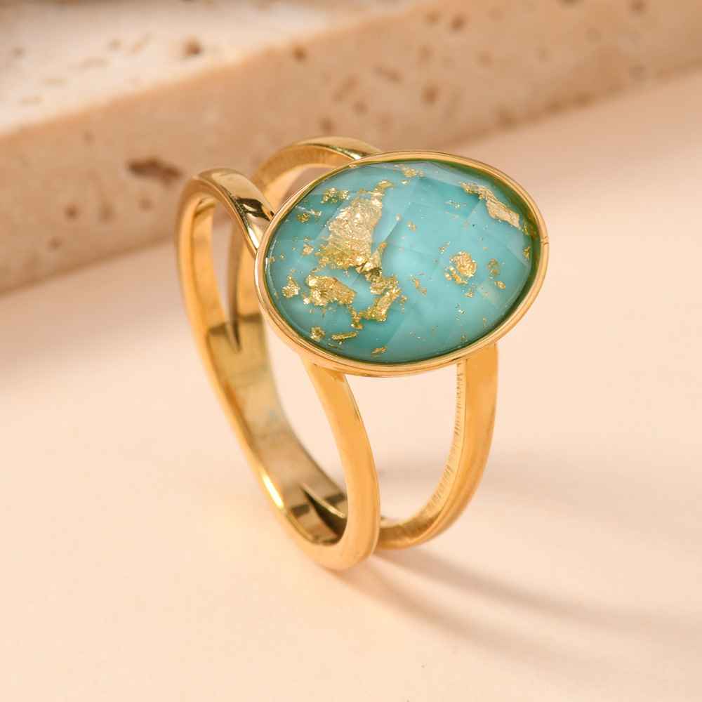 Joyas de acero inoxidable de moda europeas y americanas lujosas cortes de gota de oro óleo colorido anillo de titanio elíptico anillo de piedra preciosa