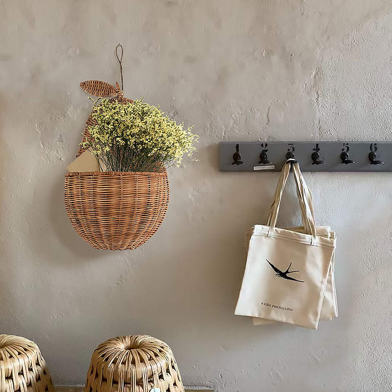 Decoración americana de la casa tela de caña colgante de pared cesto de flores tejido a mano tela de paja colgante cesto de almacenamiento colgante de pared cesto de almacenamiento