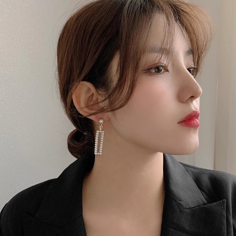 Pendientes largos con flecos elegantes y diamantes con aguja de plata Pendientes de todo fósforo de temperamento de nicho Pendientes simples y ligeros de lujo de alta gama Mujeres