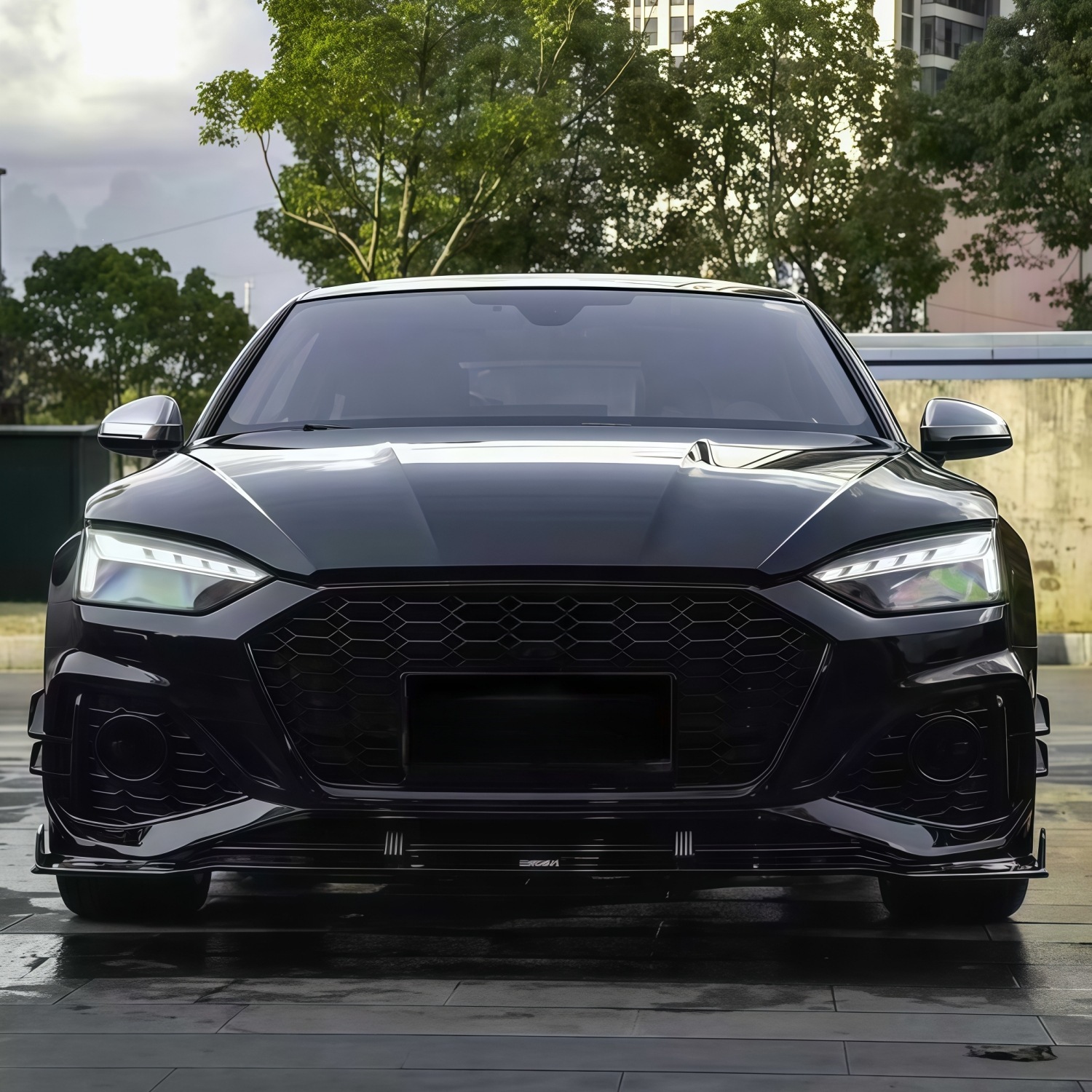 Suitable for Audi A5 2021-2024 models, RS5 rear bumper assembly, rear surround, tail lip, tail throat, and rear lower skirt, in a black finish
