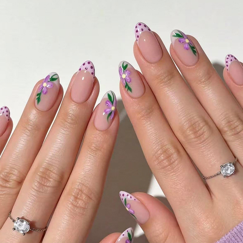 Medium-length almond-shaped pink polka dot French nails with purple flowers, fake nails for European and American wear, autumn and winter nail art pieces