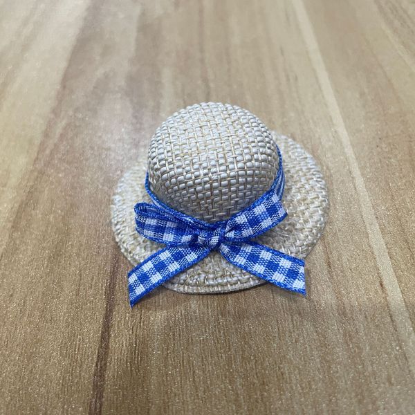 small woven plush toy with bow